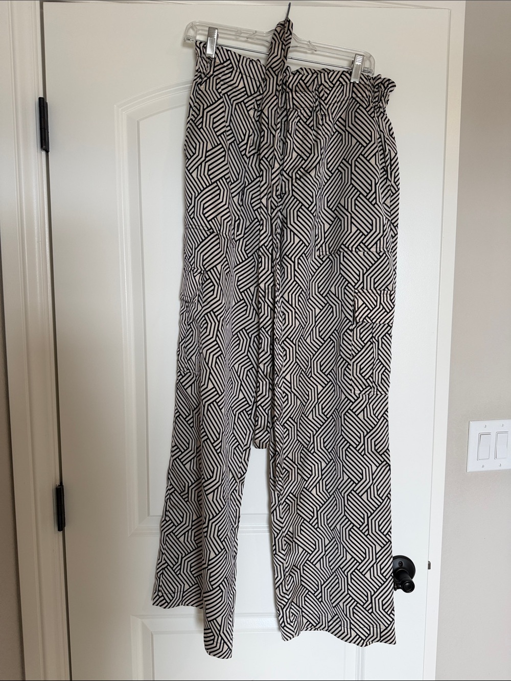 Sanctuary shiny satin high-waisted wide-legged cargo pants.